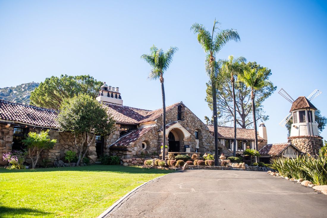Mt. Woodson Castle and its windmill across the front lawn